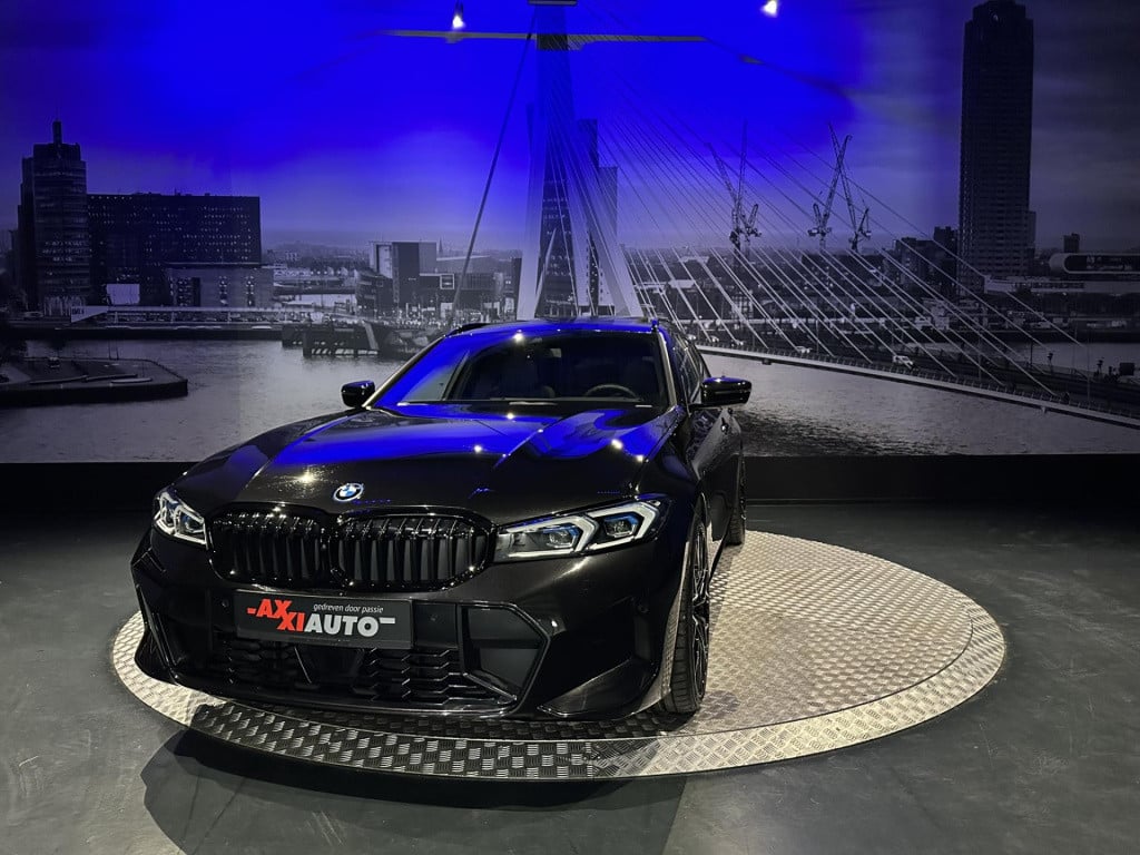BMW 3-serie touring 330e xdrive *pano*360camera*sportstoelen*laser*
