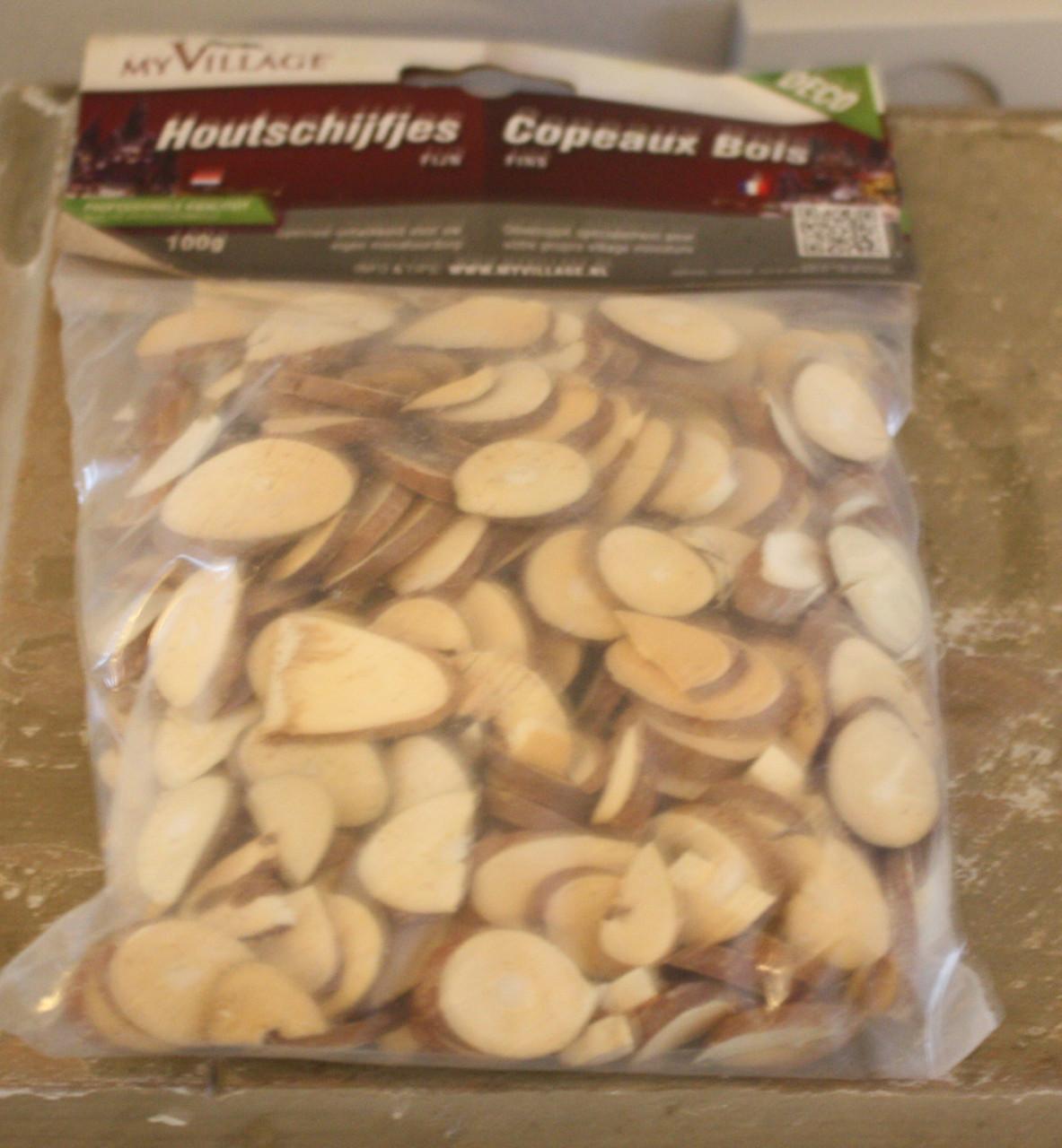 Nieuwe zak houtschijfjes hazelnoot