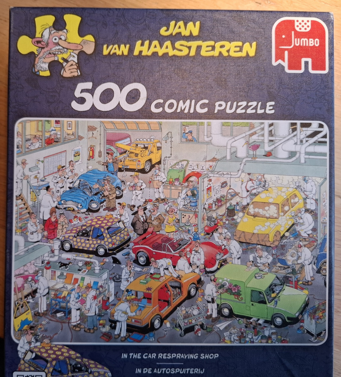 Legpuzzel Jan van Haasteren, 500 stukjes, 'In de autospuiterij'