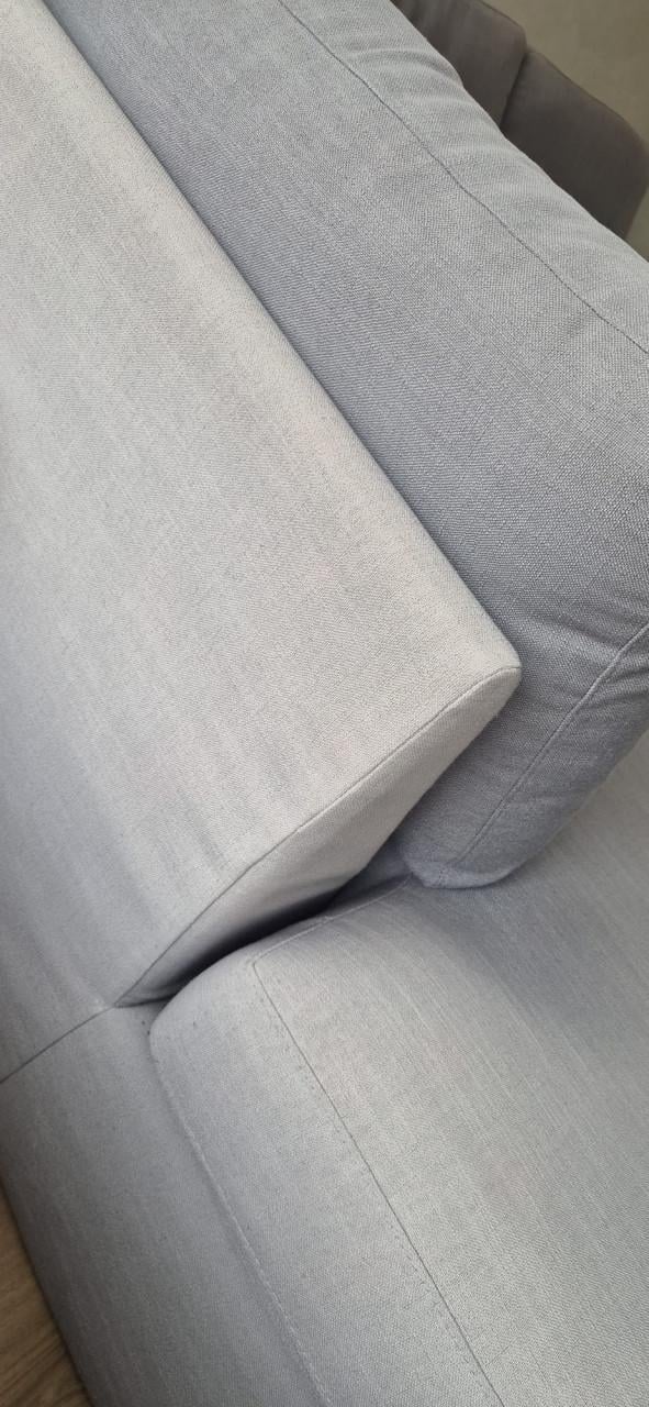 Grijze stoffen hoekbank