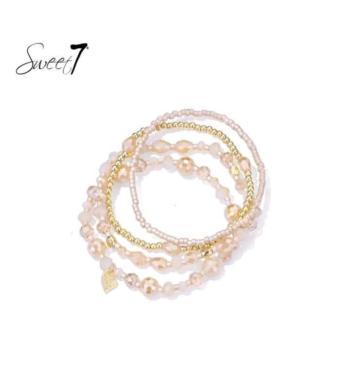 Armband set met camel kleurige kralen en goudkleurige details