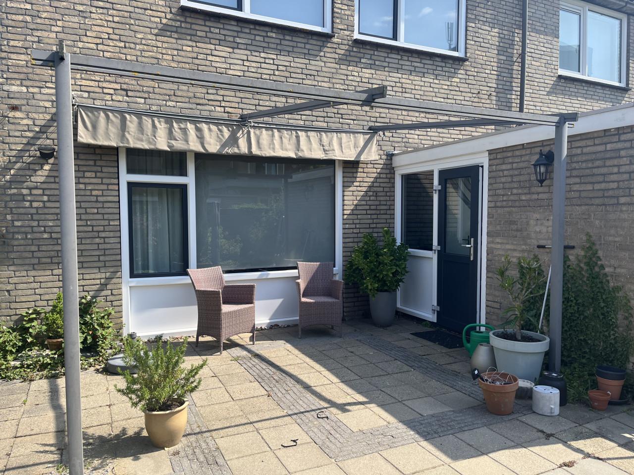 Gratis Muurpaviljoen/zonnescherm