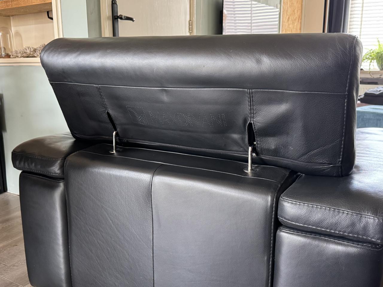 Zwarte lederen Max Divani zetel