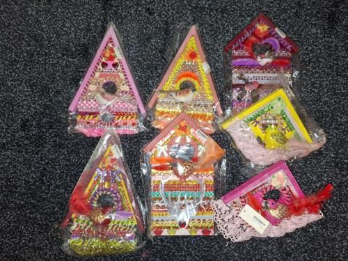 Vogelhuisjes als wanddecoratie