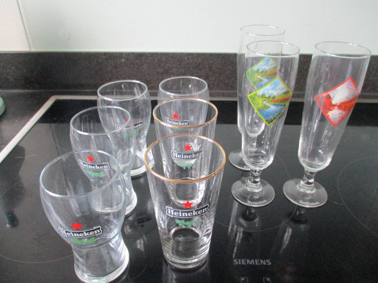 15 heineken glazen