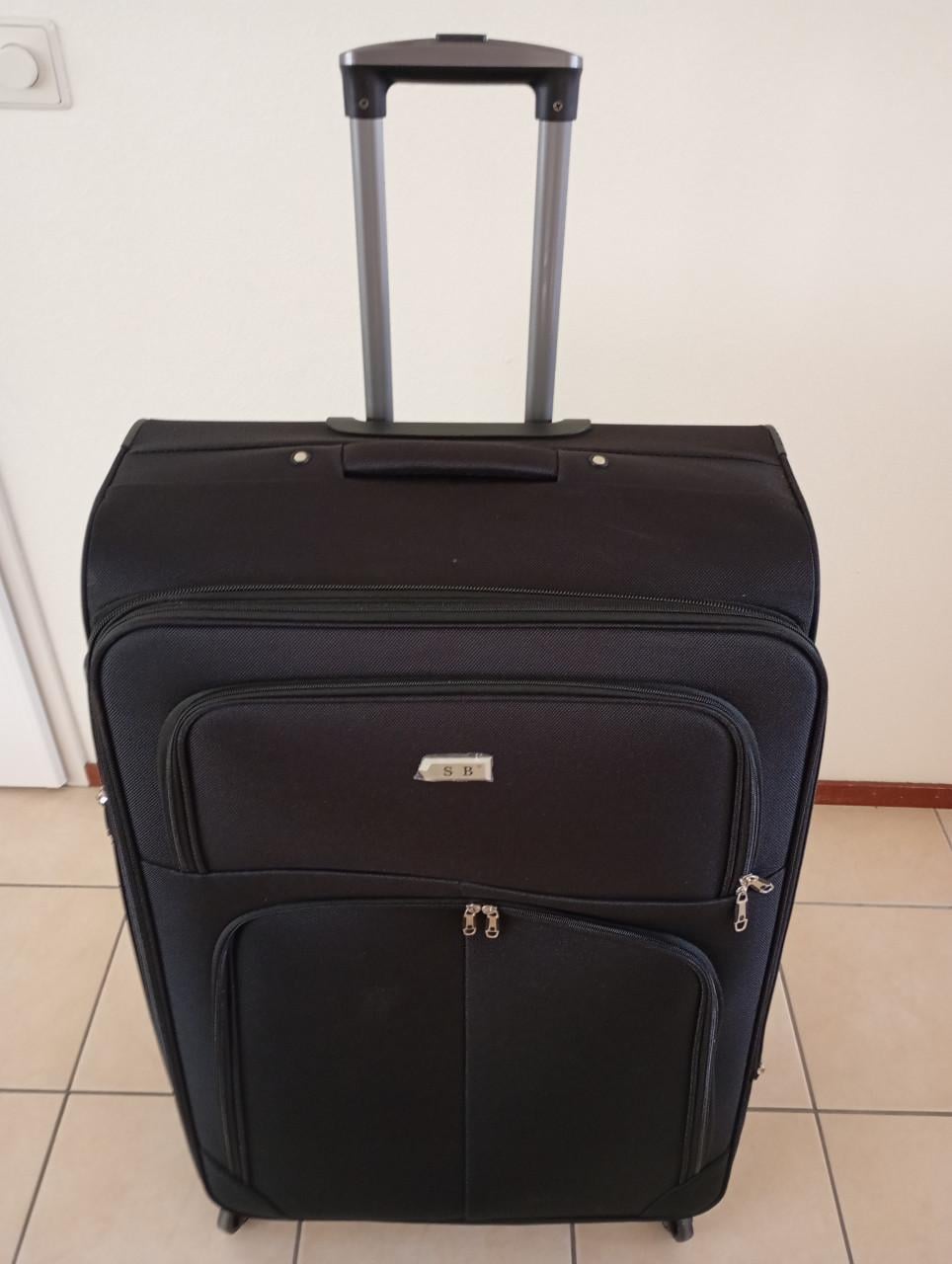 Stevige zwarte koffervan het merk S B