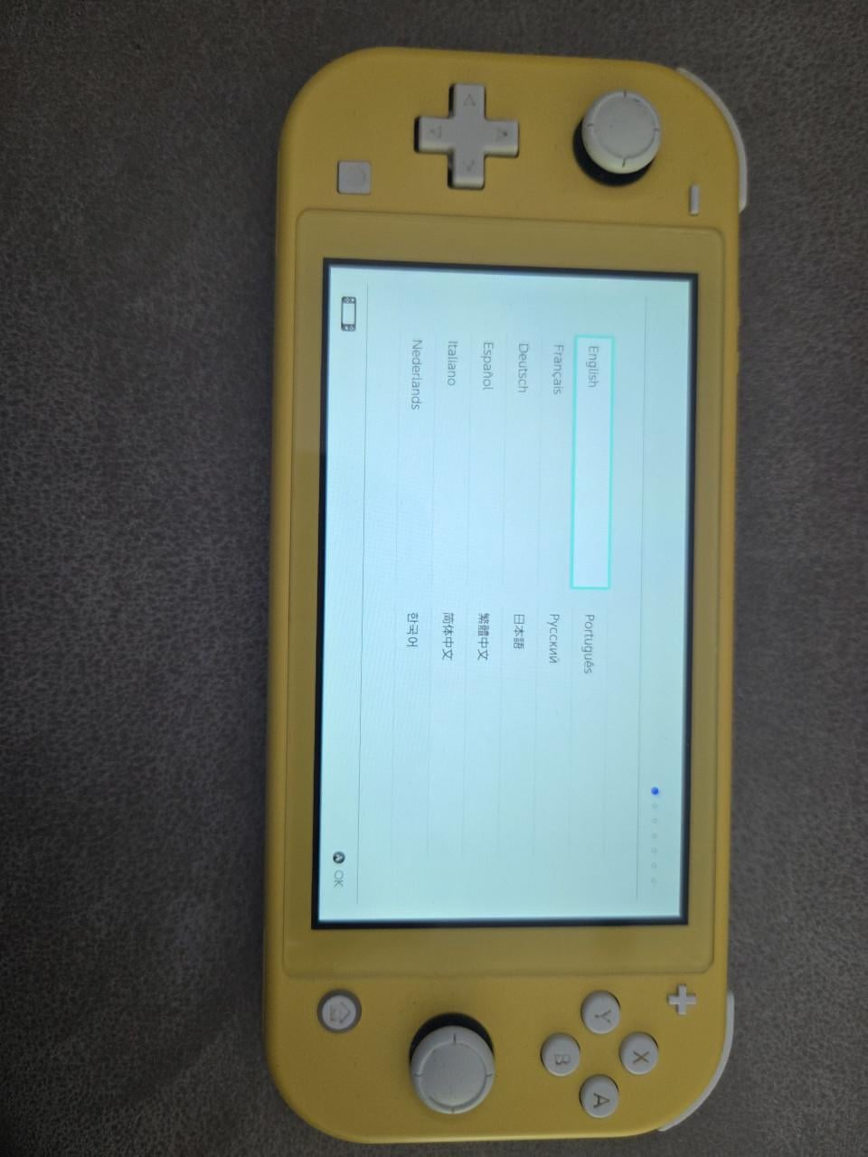 Nintendo Switch Lite grijs en geel evt. incl. spellen