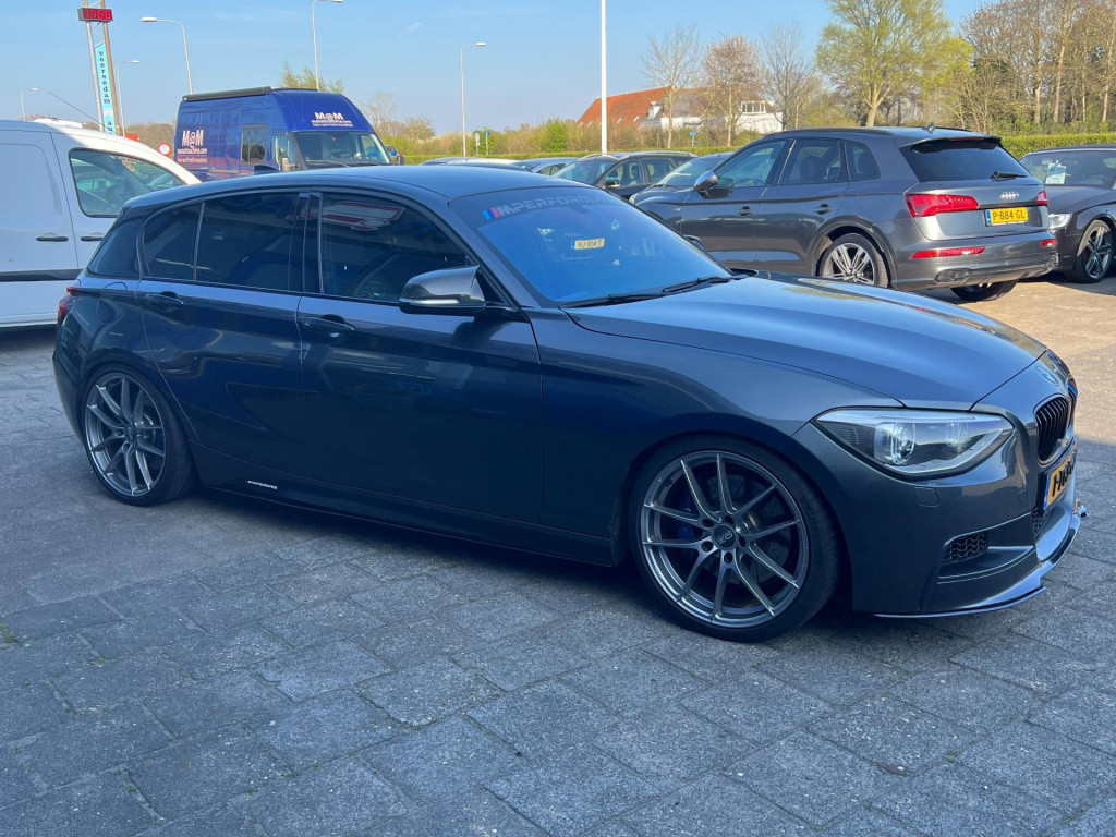 BMW 1 Serie m135i xdrive high executive, customized, stage 2 437 pk!