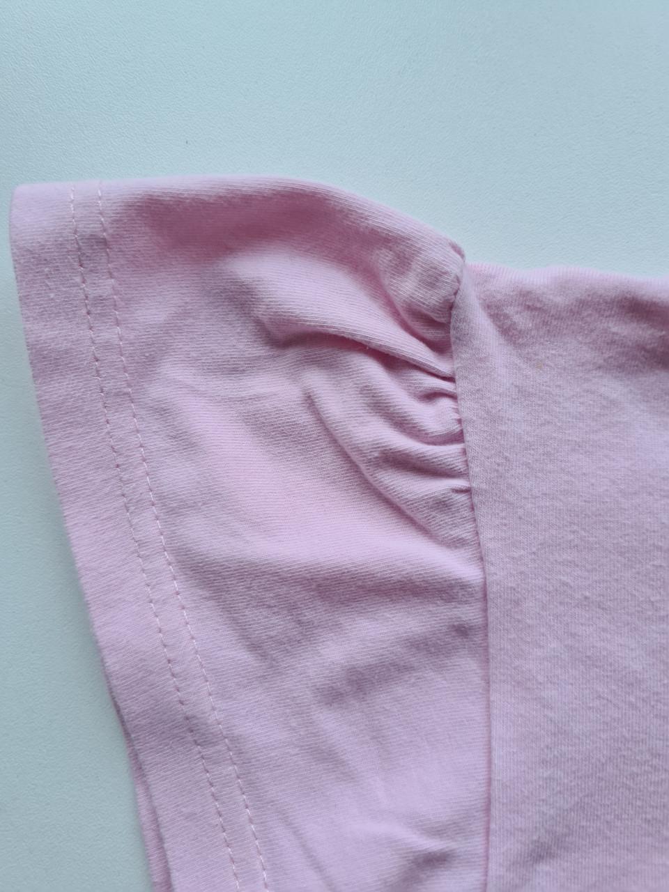 Roze shirt met leuke regenboog applicatie  Maat 128