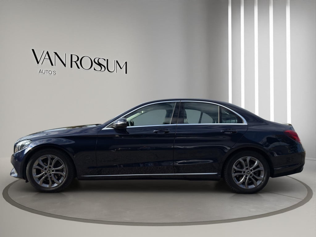 Mercedes-Benz C-Klasse c 180 business solution auto | navigatie | half lede