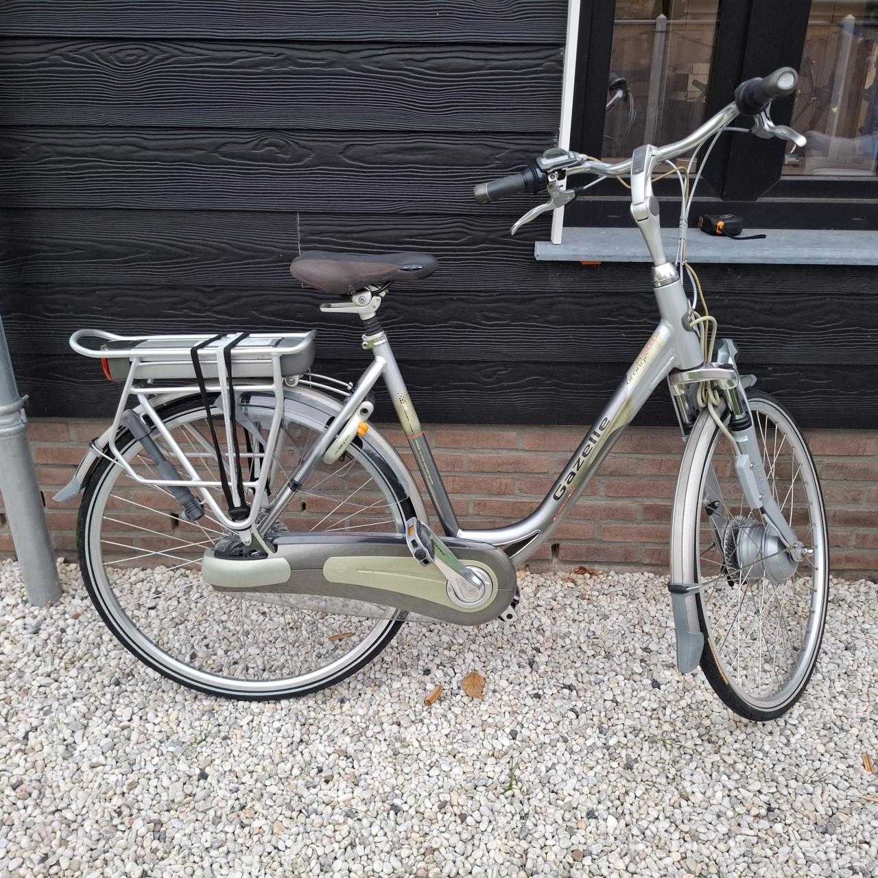 Gazelle orange elektrische dames fiets (met grap)