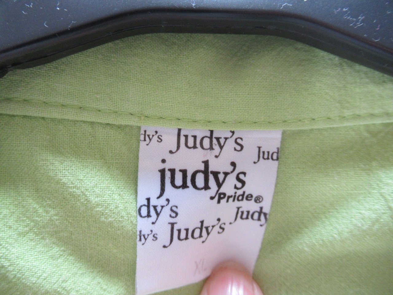 Mooie groene zomerblouse zonder mouwen, zo goed als nieuw.