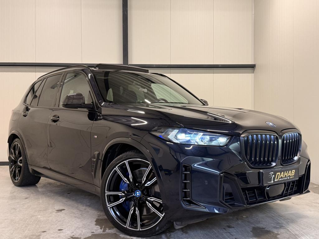 BMW X5 xdrive50e m-sport | carbon | pano | memory | stoelverwarming / verko