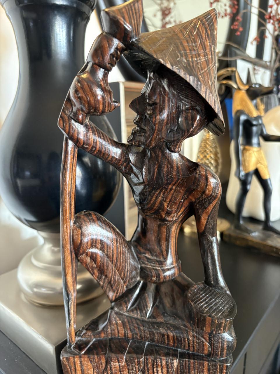 Houten beeldje uit Bali , Indonesie