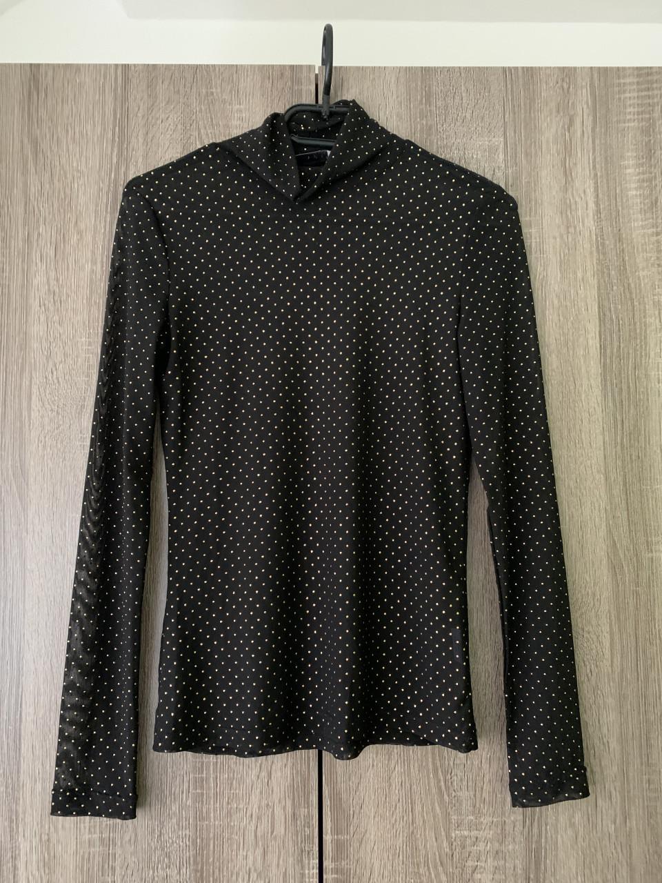 Zwarte top met gouden glitters