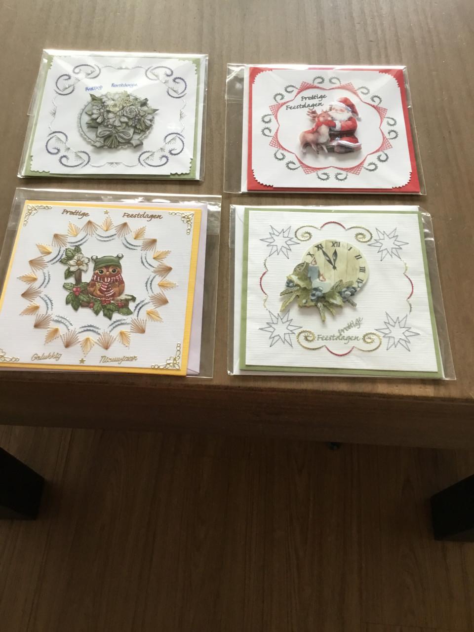 Geborduurde kerstkaarten