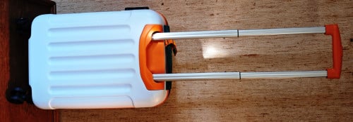 2 nieuwe compacte rolkoffers