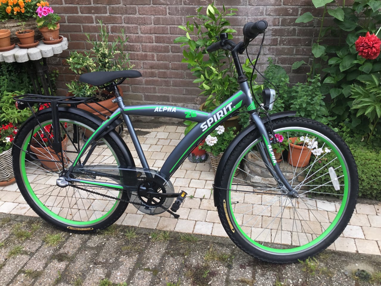 Jongensfiets met 3 versnellingen, handrem, achteruit trap rem,verlichting.