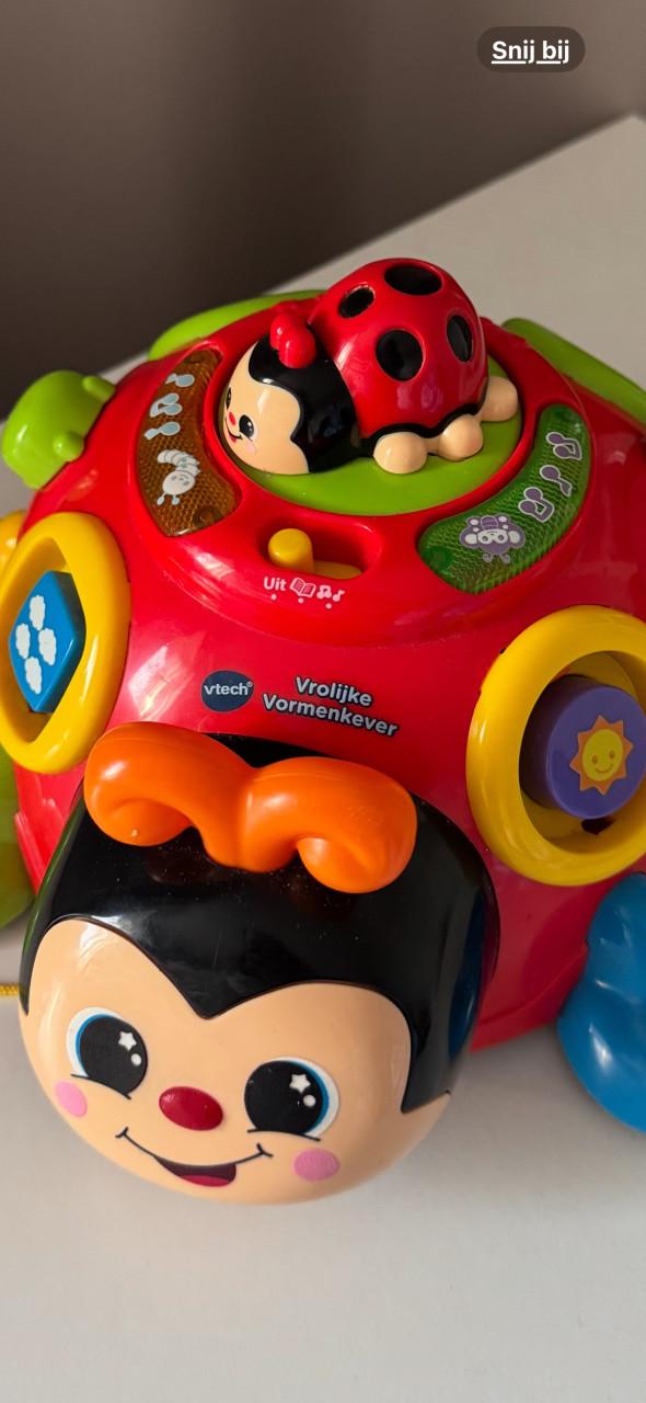 Vtech speelgoed baby kevertje met vormpjes en muziek.