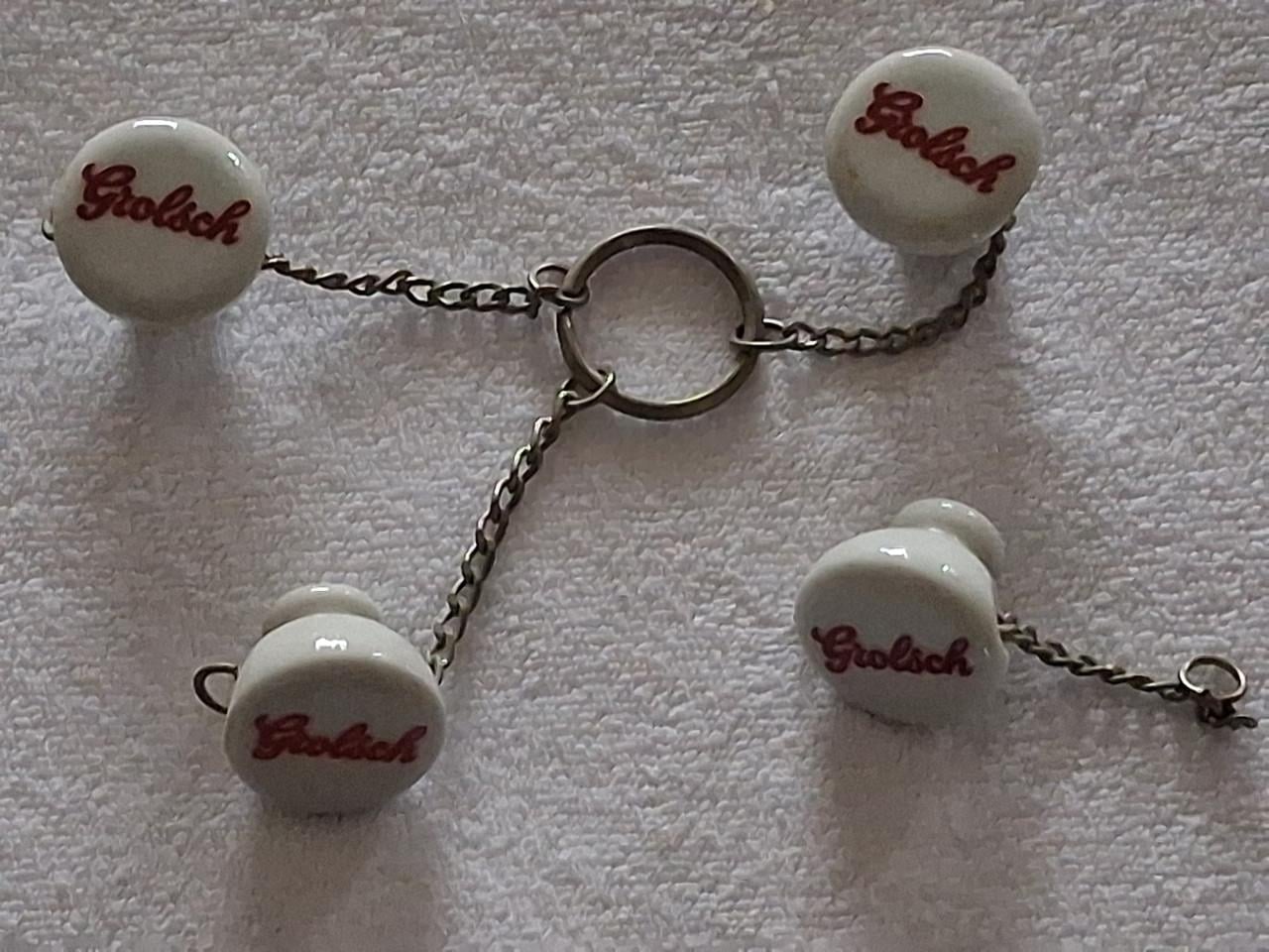 Sleutelhangers Grolsch porselein