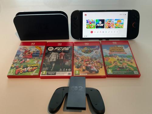 Nintendo Switch 2 + 4 games - zo goed als nieuw - compleet pakket