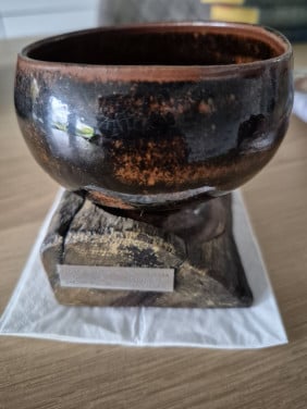 Olielampje op voet wrakhout van de Wasa.