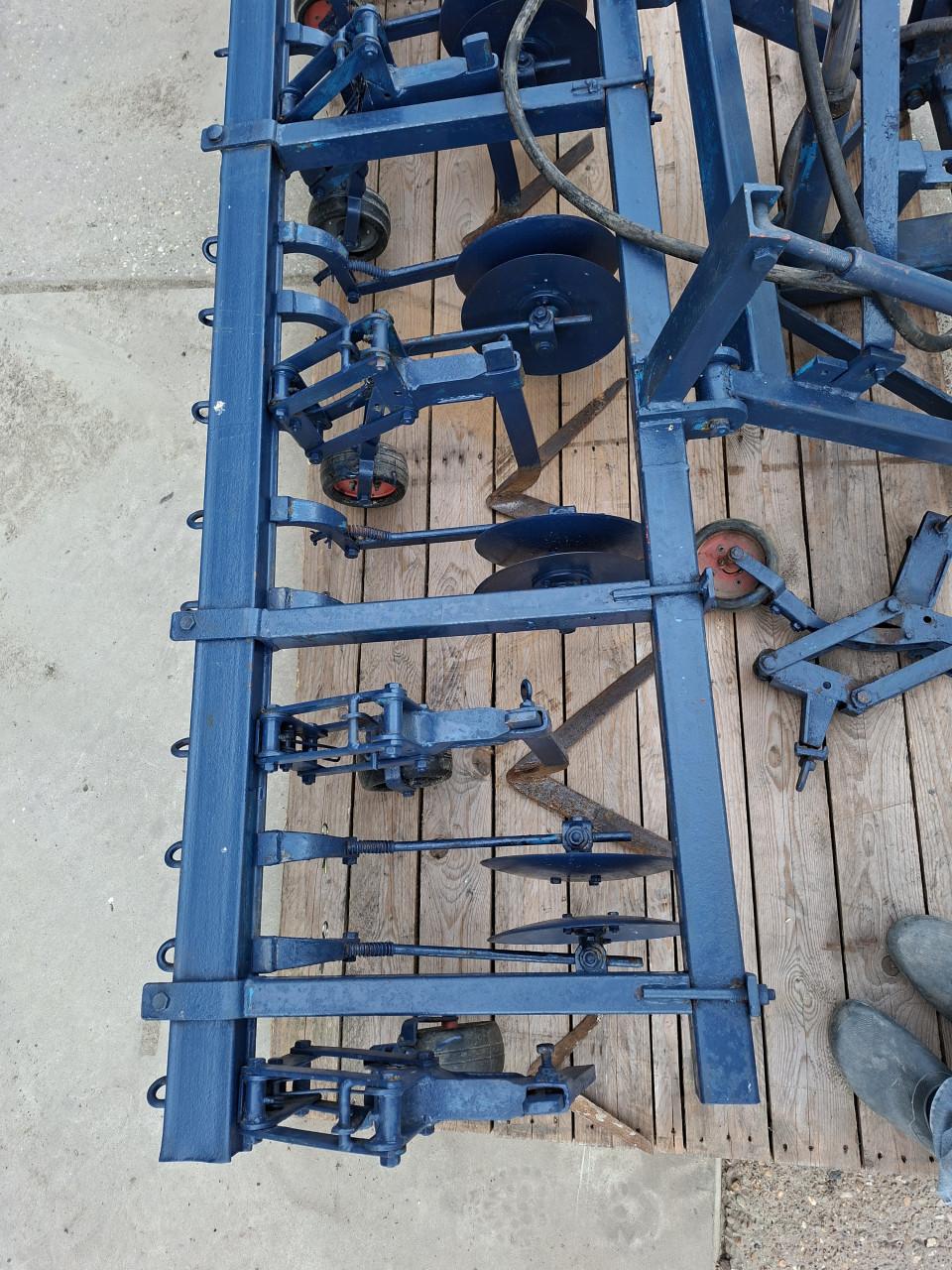 Schoffel machine met schijven
