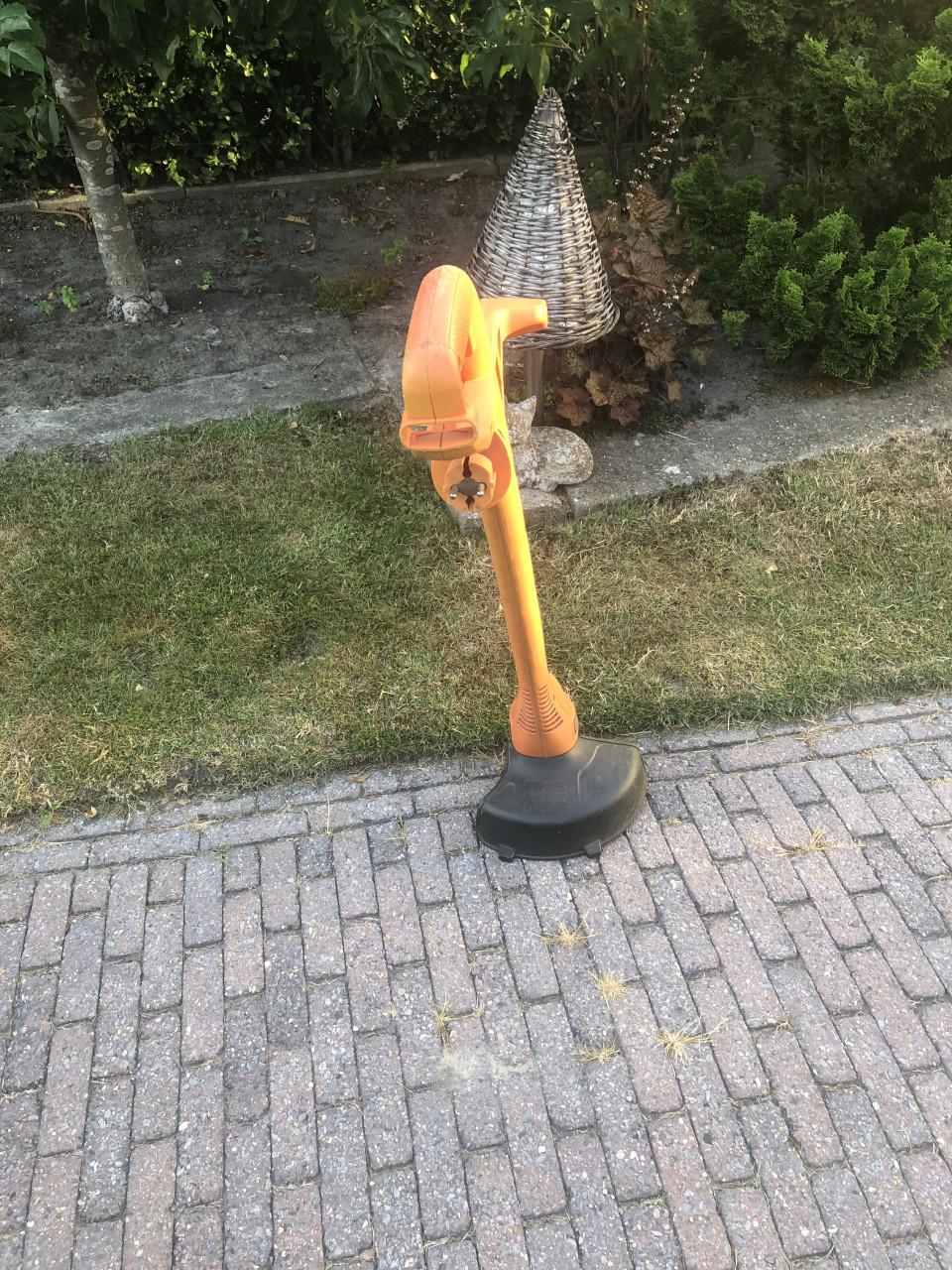 Elektrische grasmaaier en grastrimmer