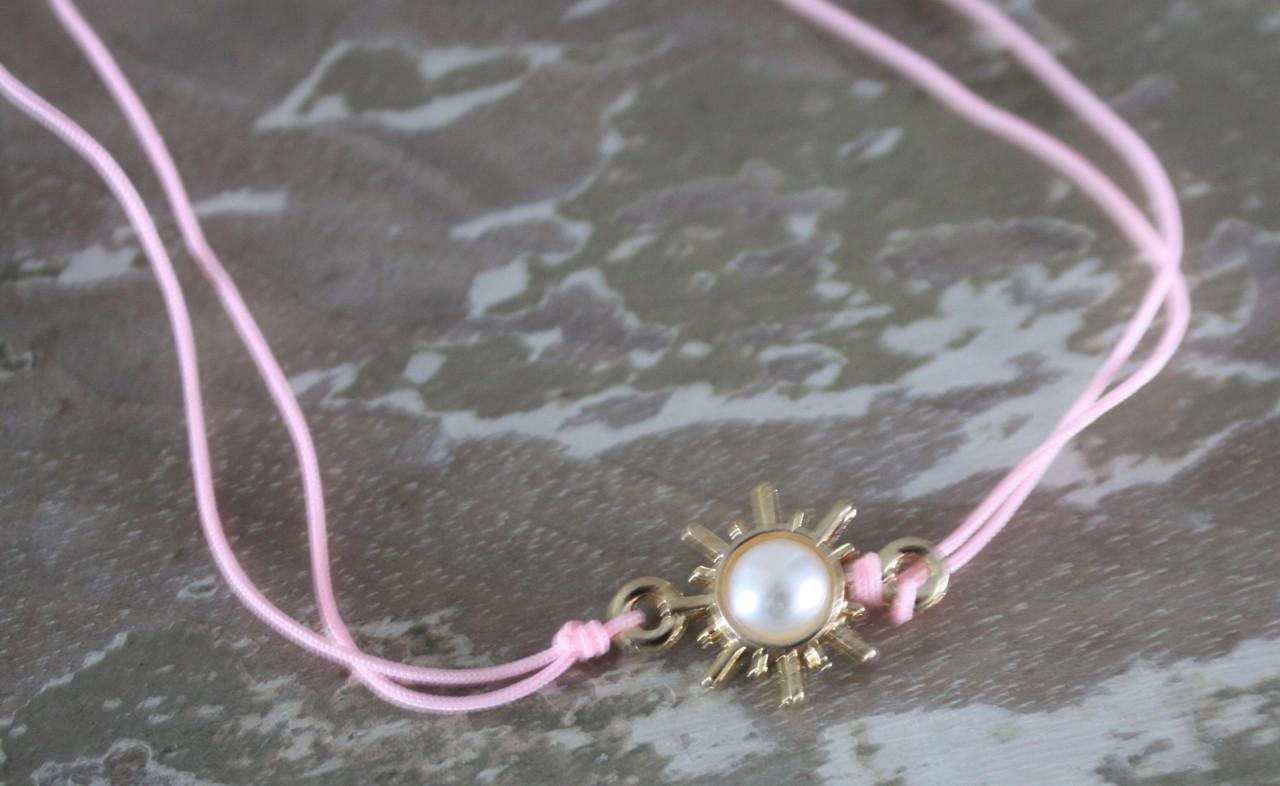 Armbandje roos touteje armband met goud zonnetje