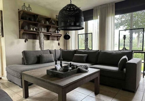 SCHITTERENDE HOEK/LOUNGEBANK IN IJZERSTERKE STOF ALPHINE BROWN SHOWMODEL