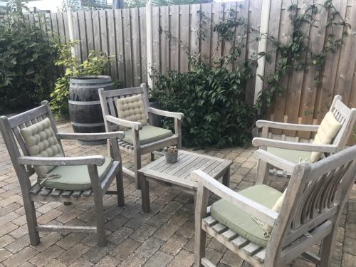 Teak houten tuinmeubelen
