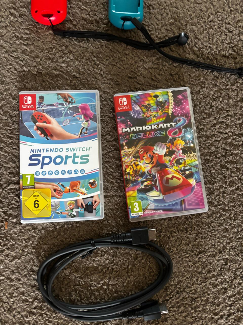 Nintendo Switch OLED met 2 games en veel accessoires