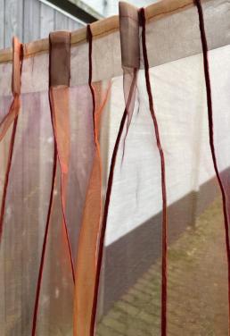 Oranje/goudkleurige vitrage