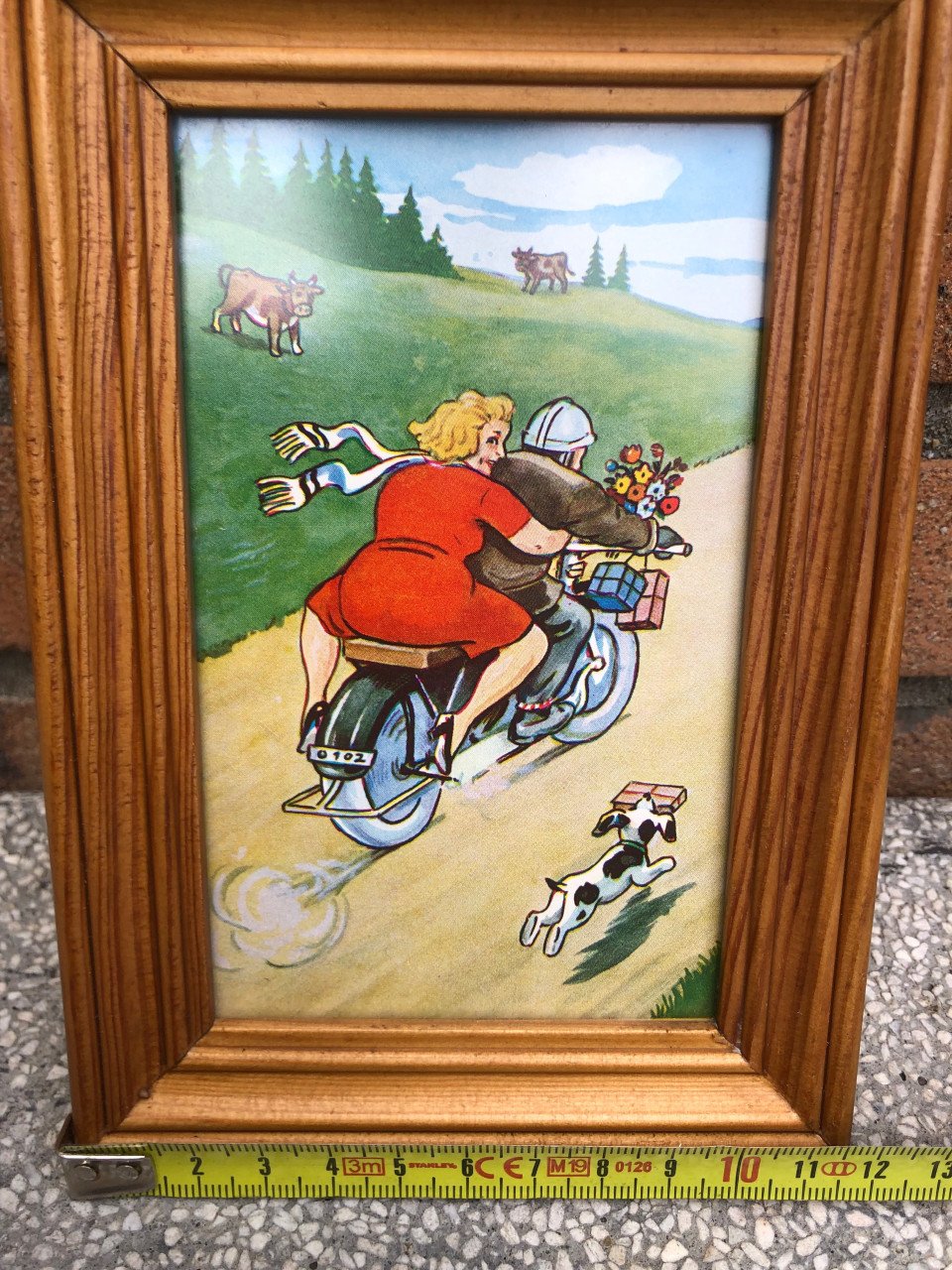Leuk lijstje met vintage prentje met een motorfiets.