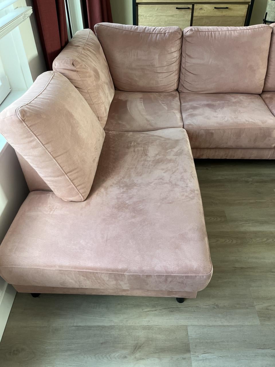 Roze hoekbank zo goed als nieuw !