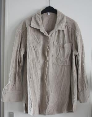 Beige blouse met ribbel  maat L