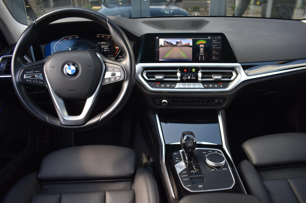 BMW 3-serie 320i high executive | harman kardon | schuif kanteldak | leder 