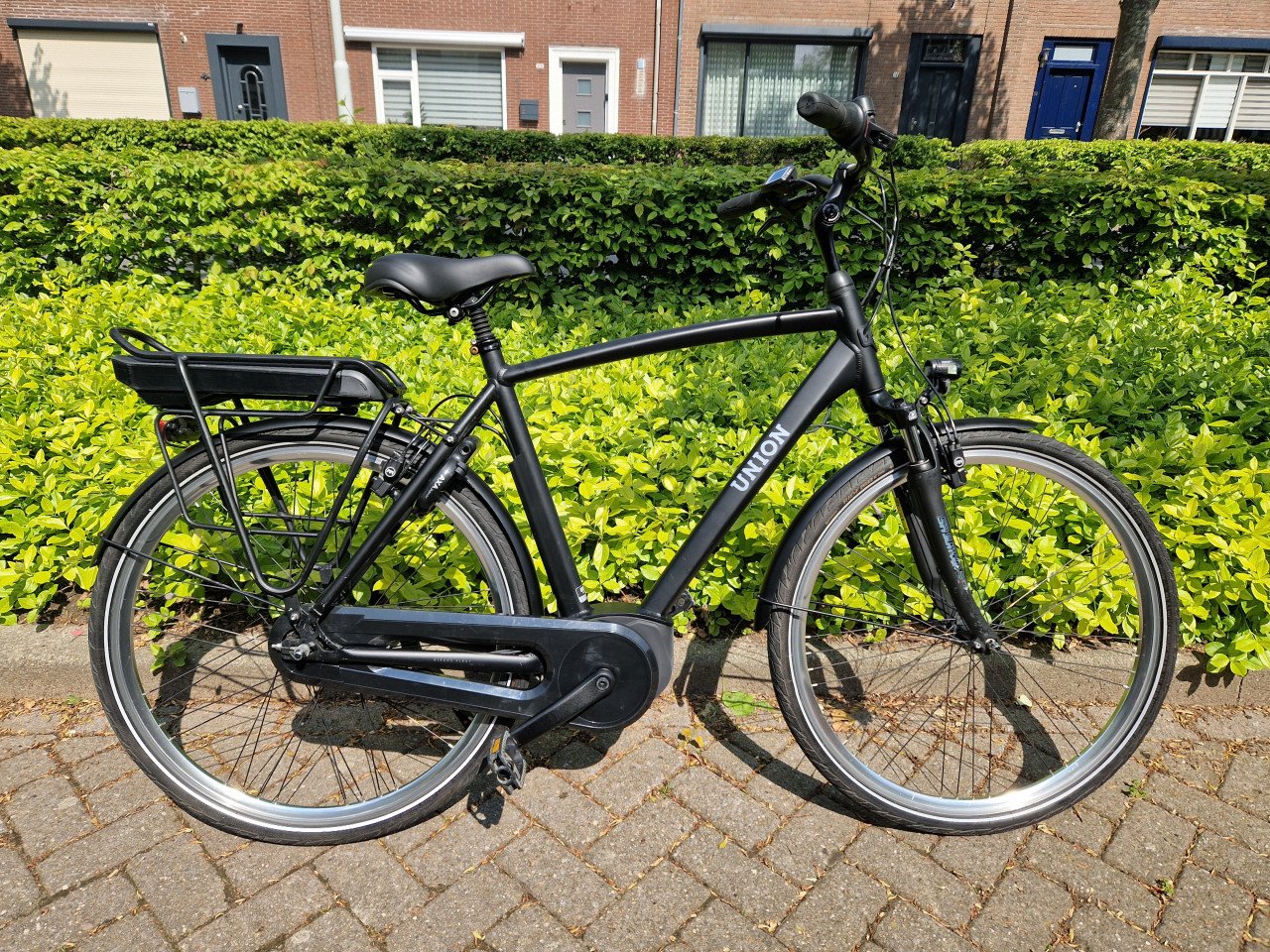 Keurig nette Union elektrische heren fiets met Bosch middenmotor