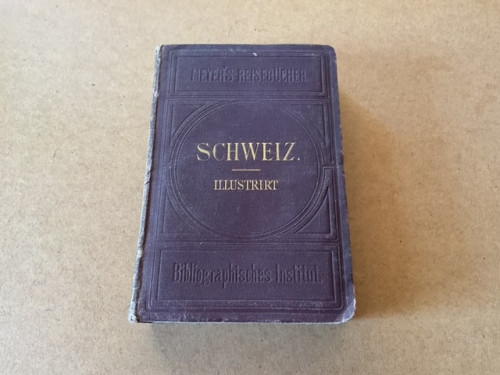 Antieke boeken: 'Schweiz illustrirt 1871', en 'Wie is dat?', 1902.