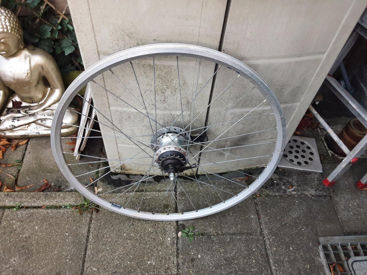 28 inch shimano achterwiel, 7 speed,terugtraprem