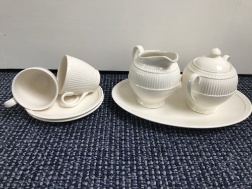 Wedgwood kop en schotel + roomstel