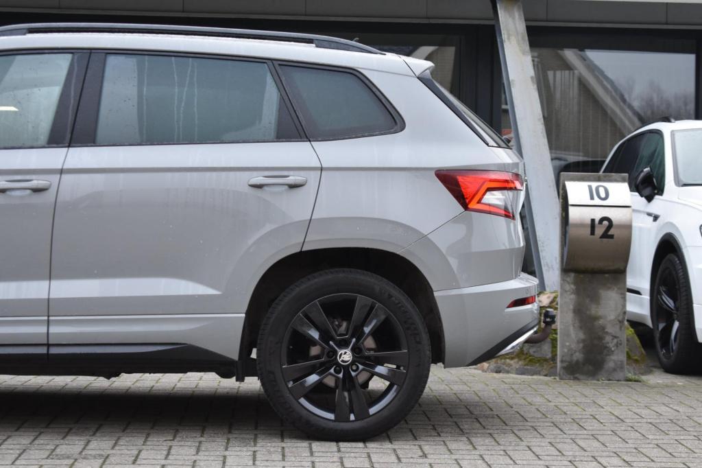Skoda Karoq 1.5 tsi act sportline | trekhaak | camera | nap | canton | appl