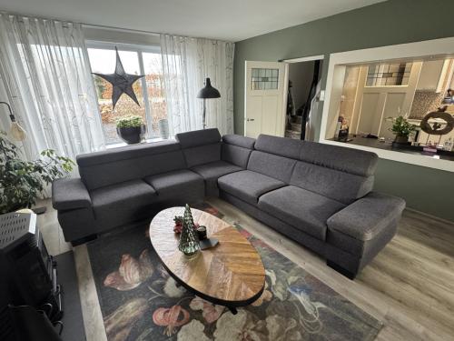 Hoekbank grijs 300*275