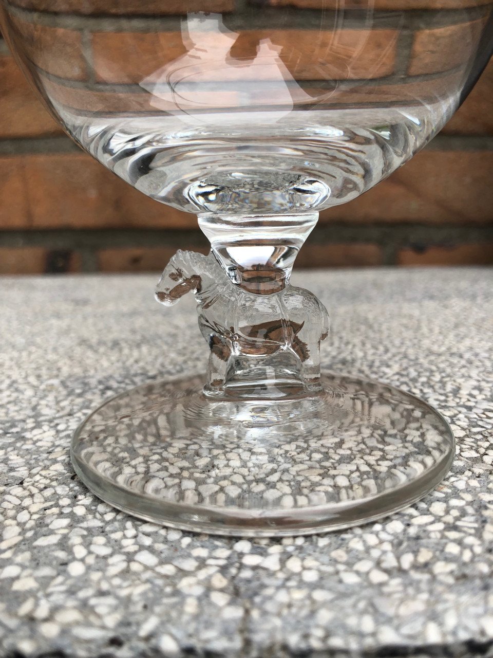 Palm bierglas met paard op de voet van het glas.