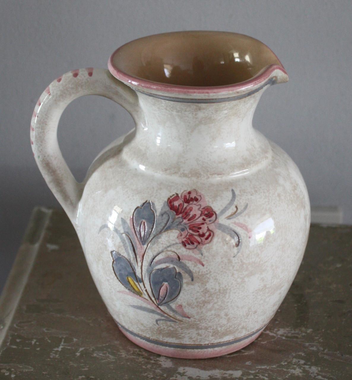 Stenen kannetje met mooie kleuren en bloemenprint