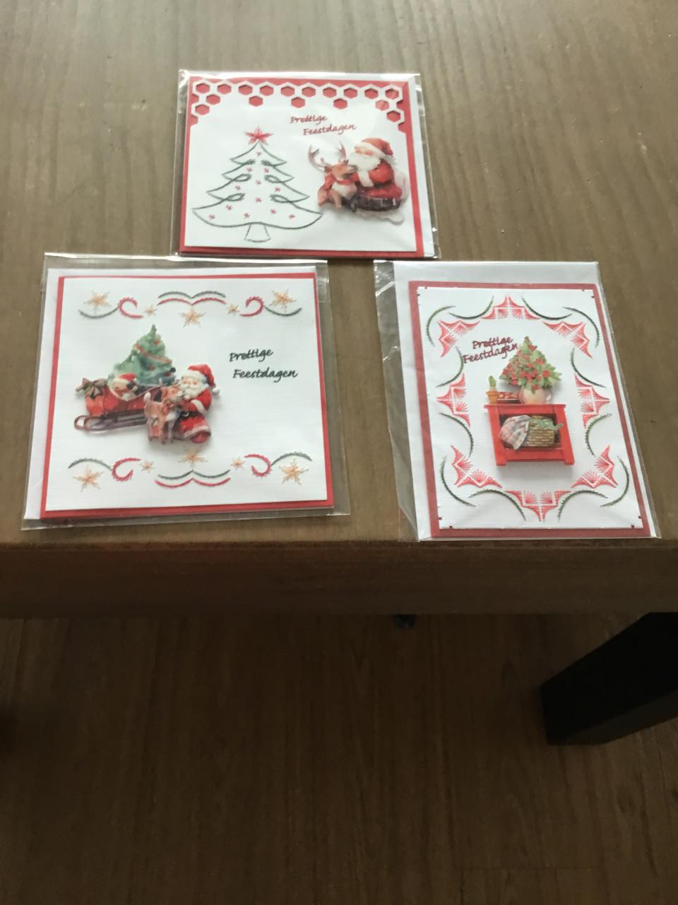 Geborduurde kerstkaarten