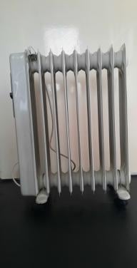 Oliegevulde radiator kachel