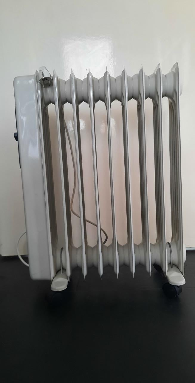 Oliegevulde radiator kachel