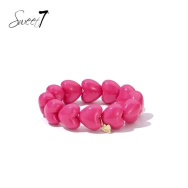 Armband fashion sieraad met roze hartjes