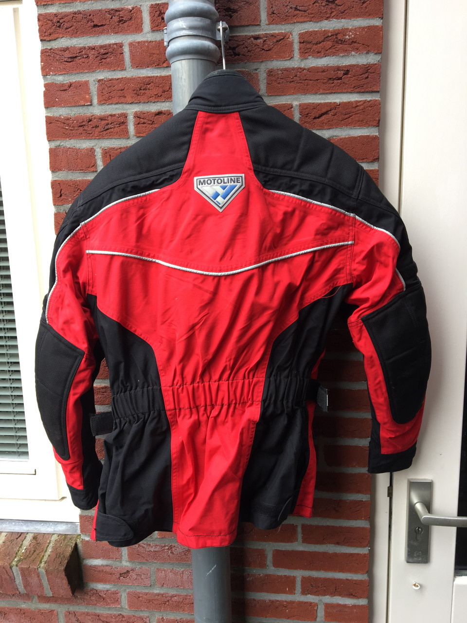 Motorjas met protectie reflectie en thermo voering maat 42 in goede staat